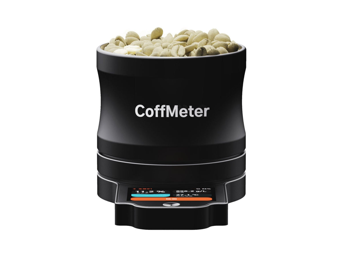 DiFluid CoffMeter M1 moisture and density meter filled with green coffee