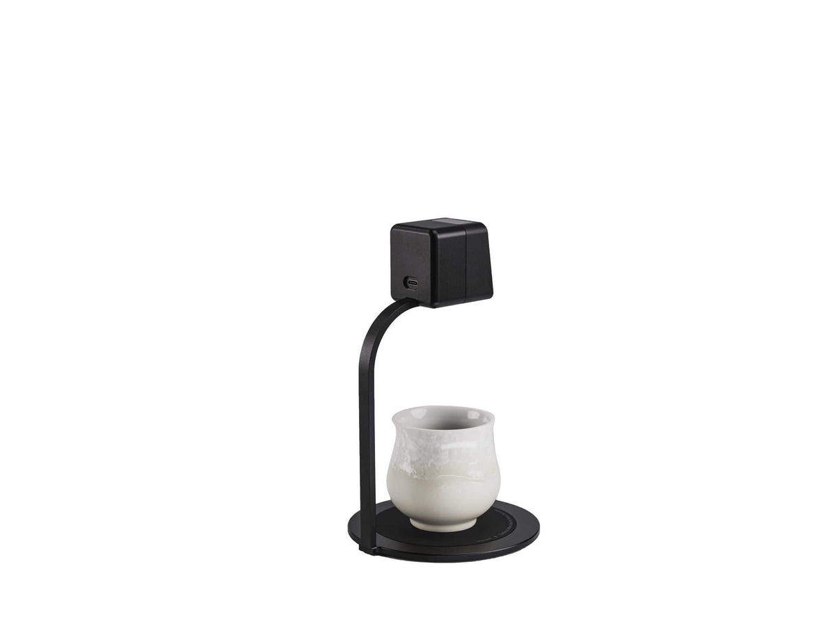 DiFluid Moment flavor reference thermometer over a cup of coffee