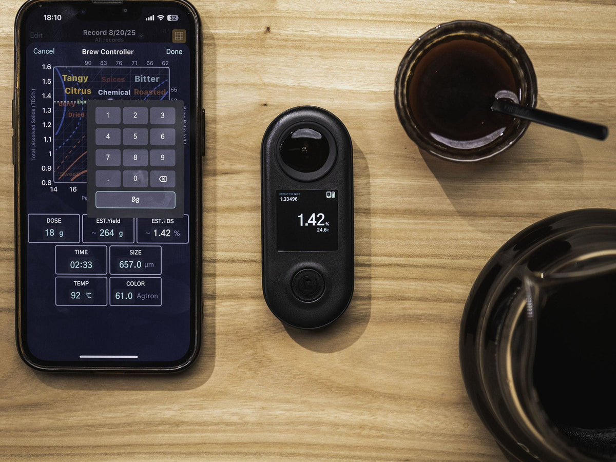DiFluid R2 Extract next to a phone running the DiFluid Café app brew control chart